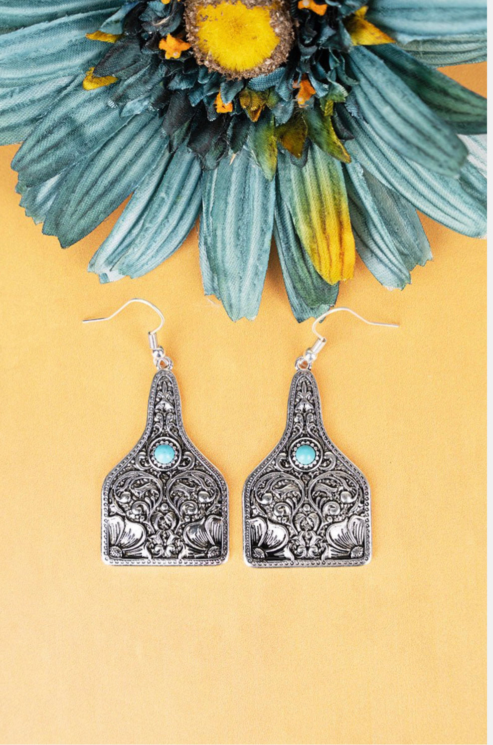 Turquoise cow tag earrings
