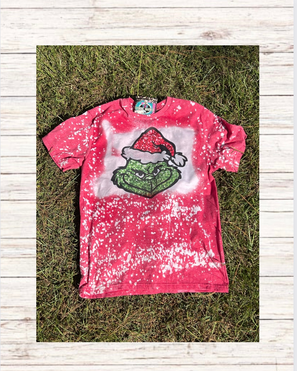 “Green man” bleached red tee