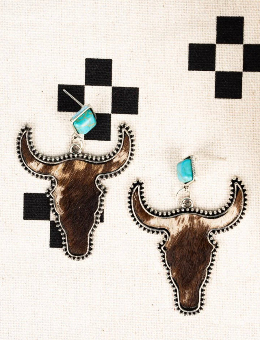 Turquoise ranch brown cow