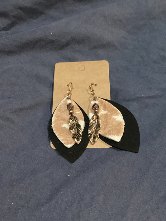 Cow print tear drop feather